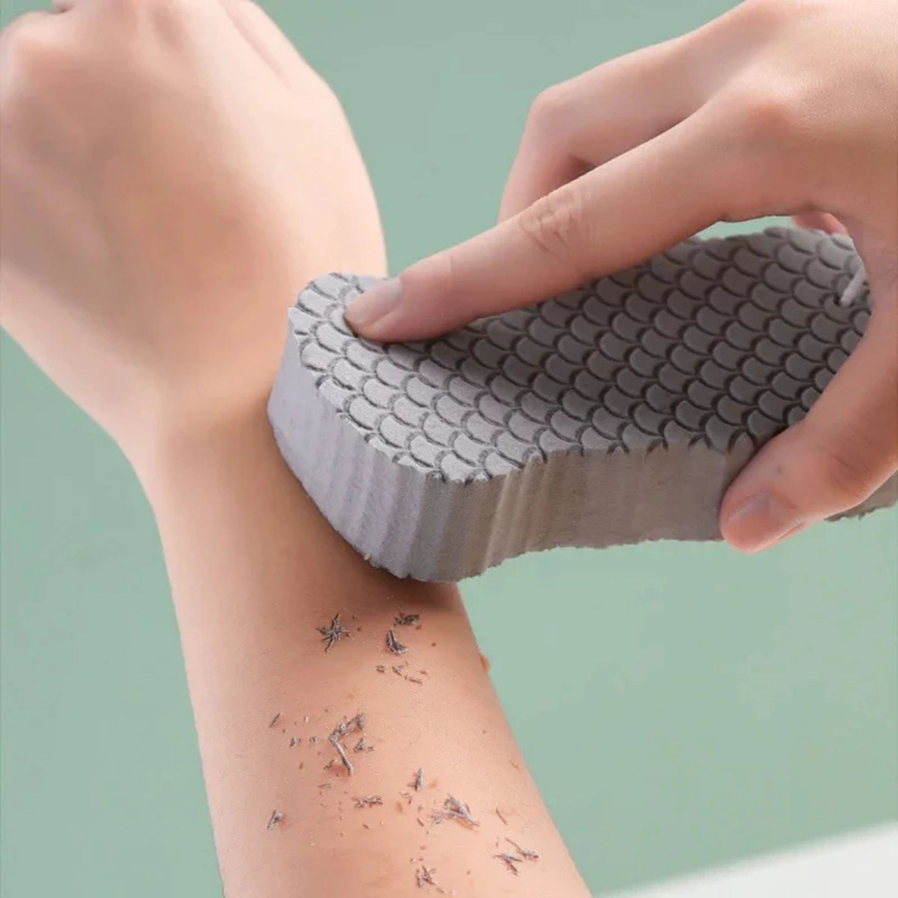 Burete durabil cu dublu relief pentru o exfoliere mai bună