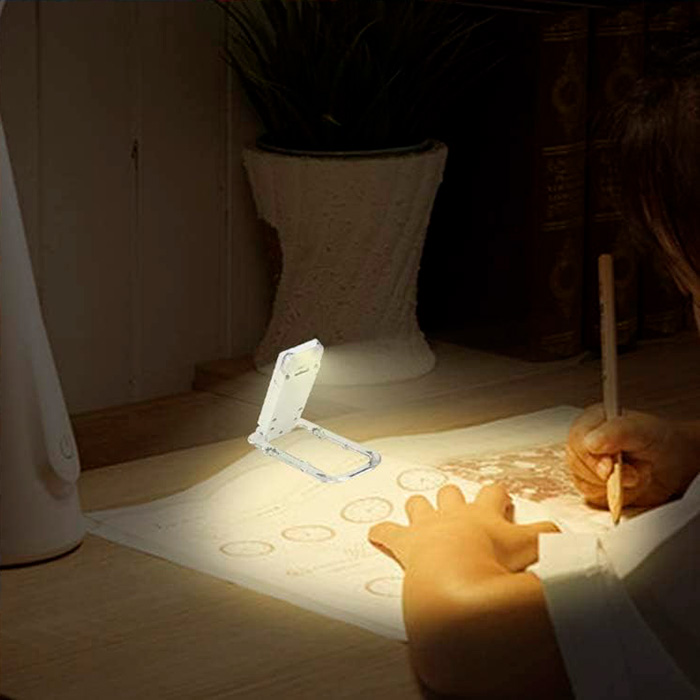 ReadLed, o mini lampă LED care poate fi montată pe o carte - Image 8